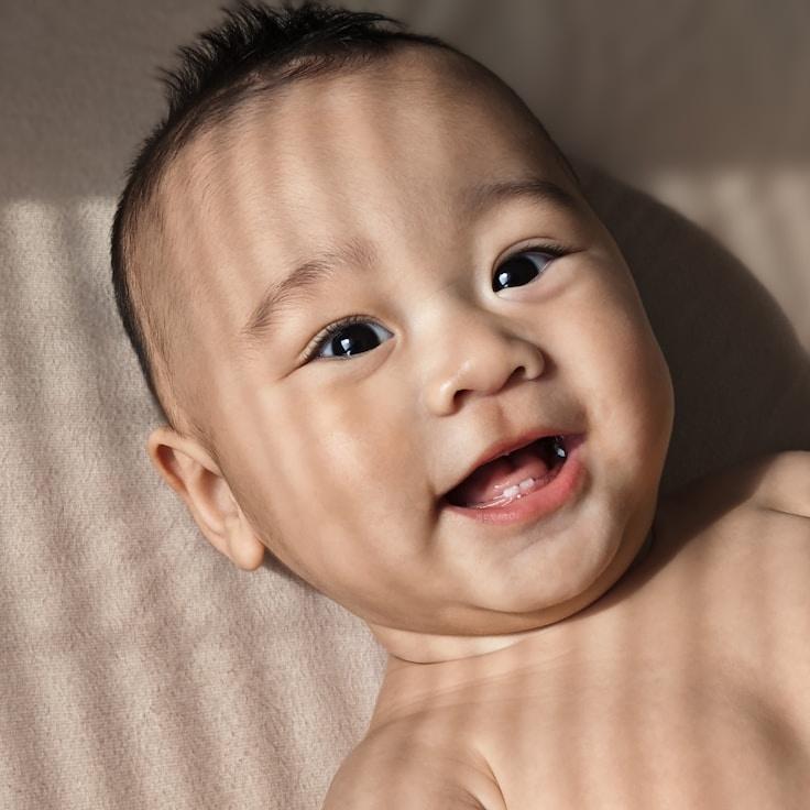 Mira Rao, Lead Design Curator at Hidden Forest Collective, reviewing corporate floral arrangements